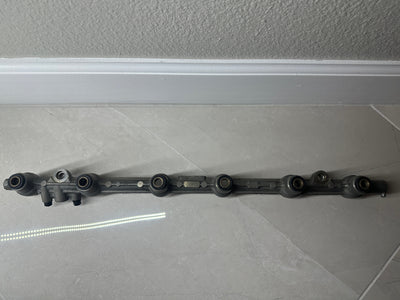 Toyota Supra MK4 OEM genuine fuel rail backside